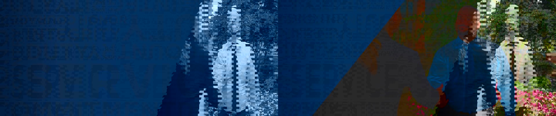 Wounded warrior Michael Carrasquillo shakes hands with an employer.