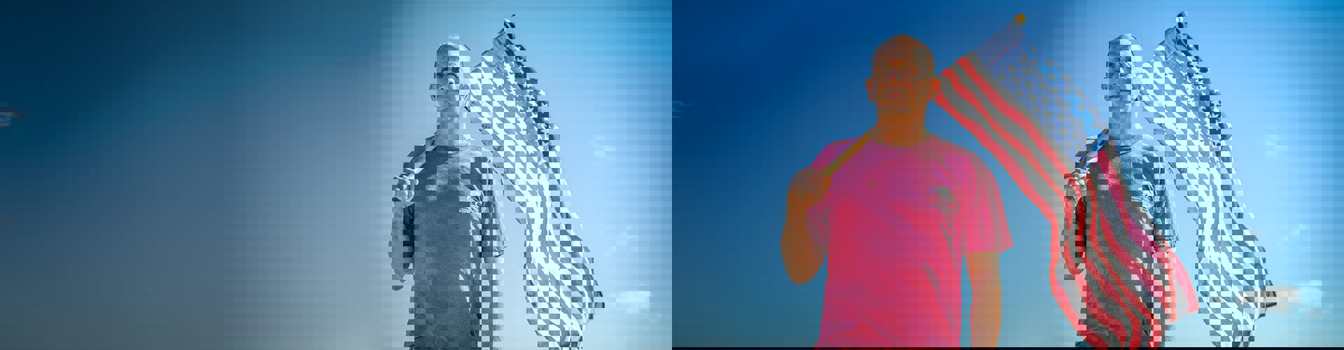 Wounded warrior James Rivera holding an American flag