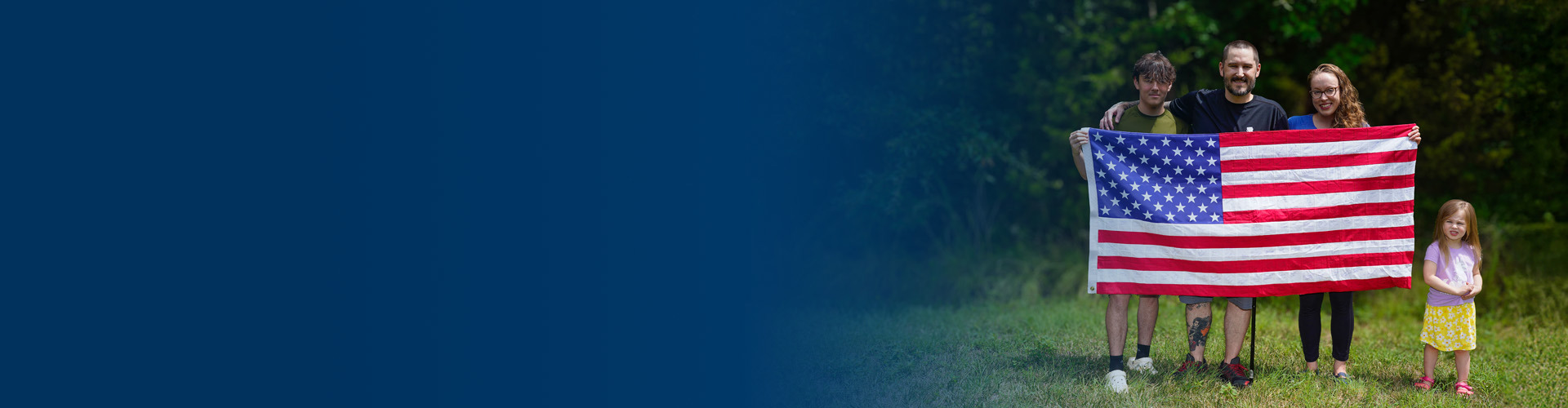 Wounded Warrior Xander Hernandez With His Family Holding American Flag