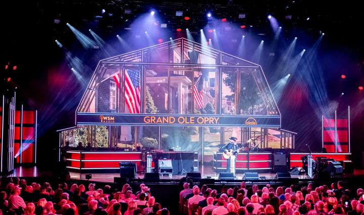 Wounded warrior Sal Gonzalez performs on stage at the Grand Ole Opry.